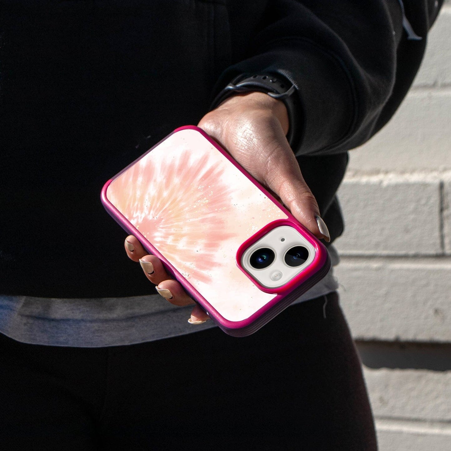 iPhone 14 Peach Sparkle Tie Dye Case - Fremont Grip (Girl in Black holding a phone)