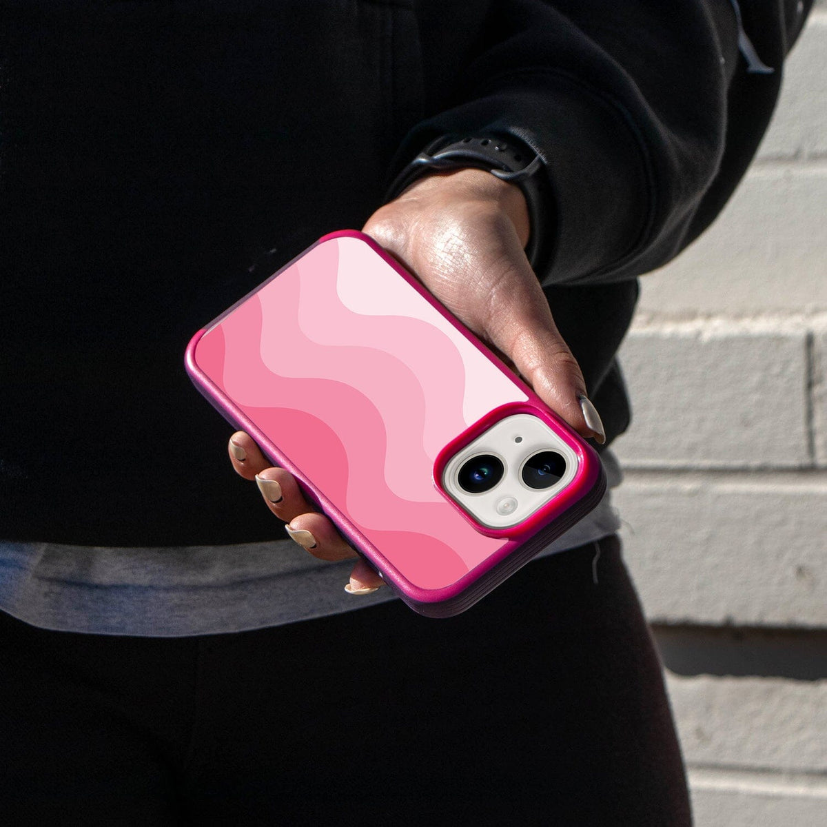 iPhone 14 Pink Wave Design Case - Fremont Grip (Girl on Black holding a phone)