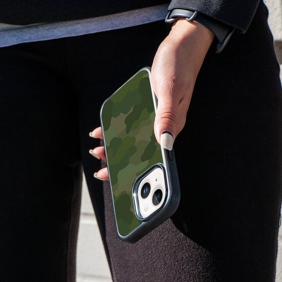 iPhone 14 Plus Green Camo Design Case - Fremont Grip (Lifestyle Stot - Girl in Black holding her phone)