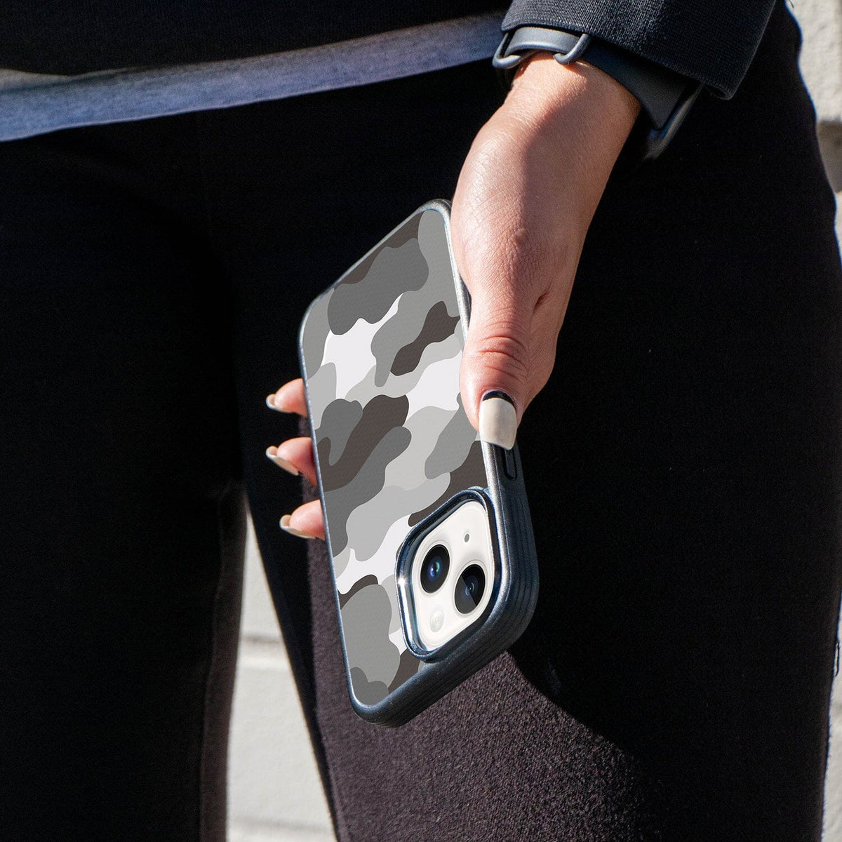 iPhone 14 Plus Grey Camo Case - Fremont Grip Lifestyle (Girl in Black holding her Phone)