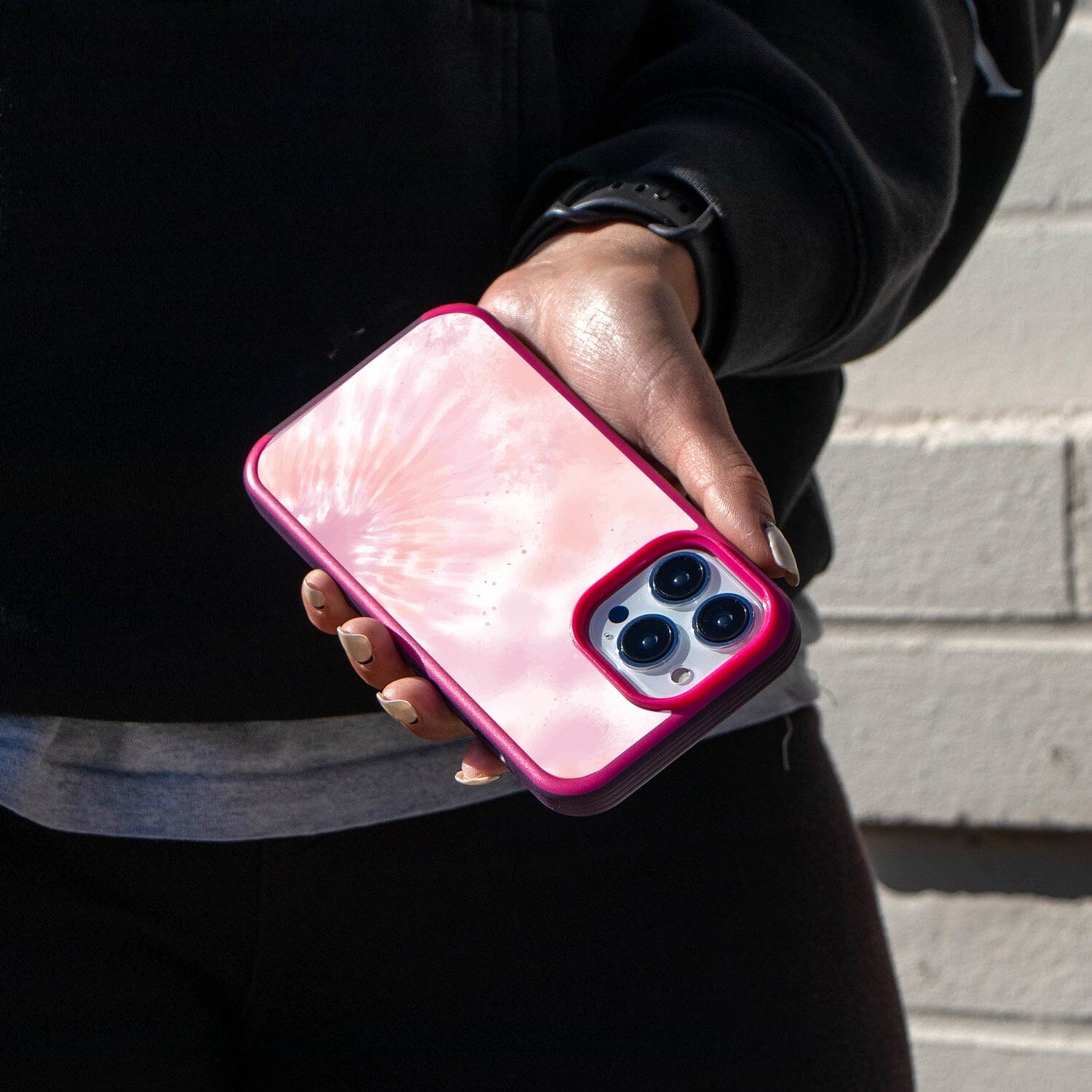 iPhone 14 Pro Pink Bubble Gum Tie Dye Design Case - Fremont Grip (Girl in Black holding a Phone)